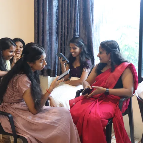 Treneywann Management Studies faculty in traditional Kerala attire, Onam 2026 at the Vyttila campus, Kochi